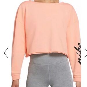 Nike Peach Cropped Sweatshirt with Black Sleeve Logo